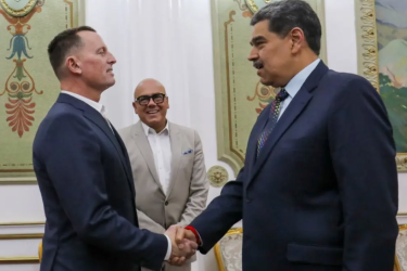 Venezuelan President Nicolas Maduro (right) greets the special envoy of US President Donald Trump, Richard Grenell, in Caracas.